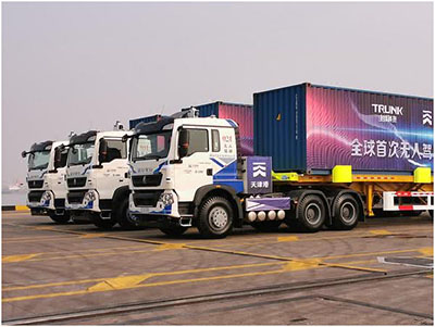 25 sinotruk howo T5G unmanned electric trucks operate in Tianjin port